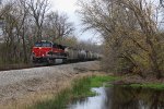 PESI slows for the junction ahead as it rolls through low wetlands near the Illinois River